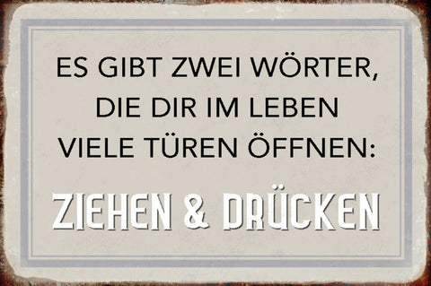 Schild Spruch Es gibt zwei Wörter die viele Türen öffnen Ziehen und Drücken JW